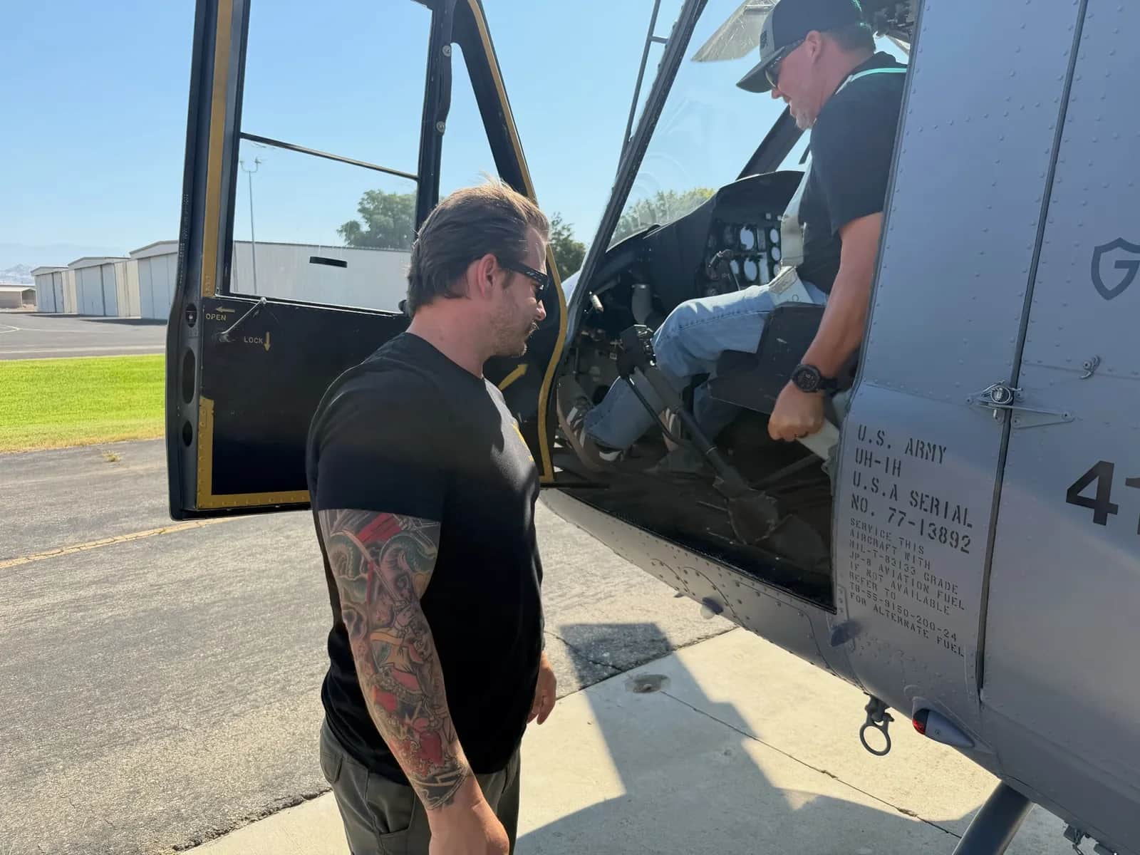Phoenix crew conducting a Huey cockpit preflight inspection